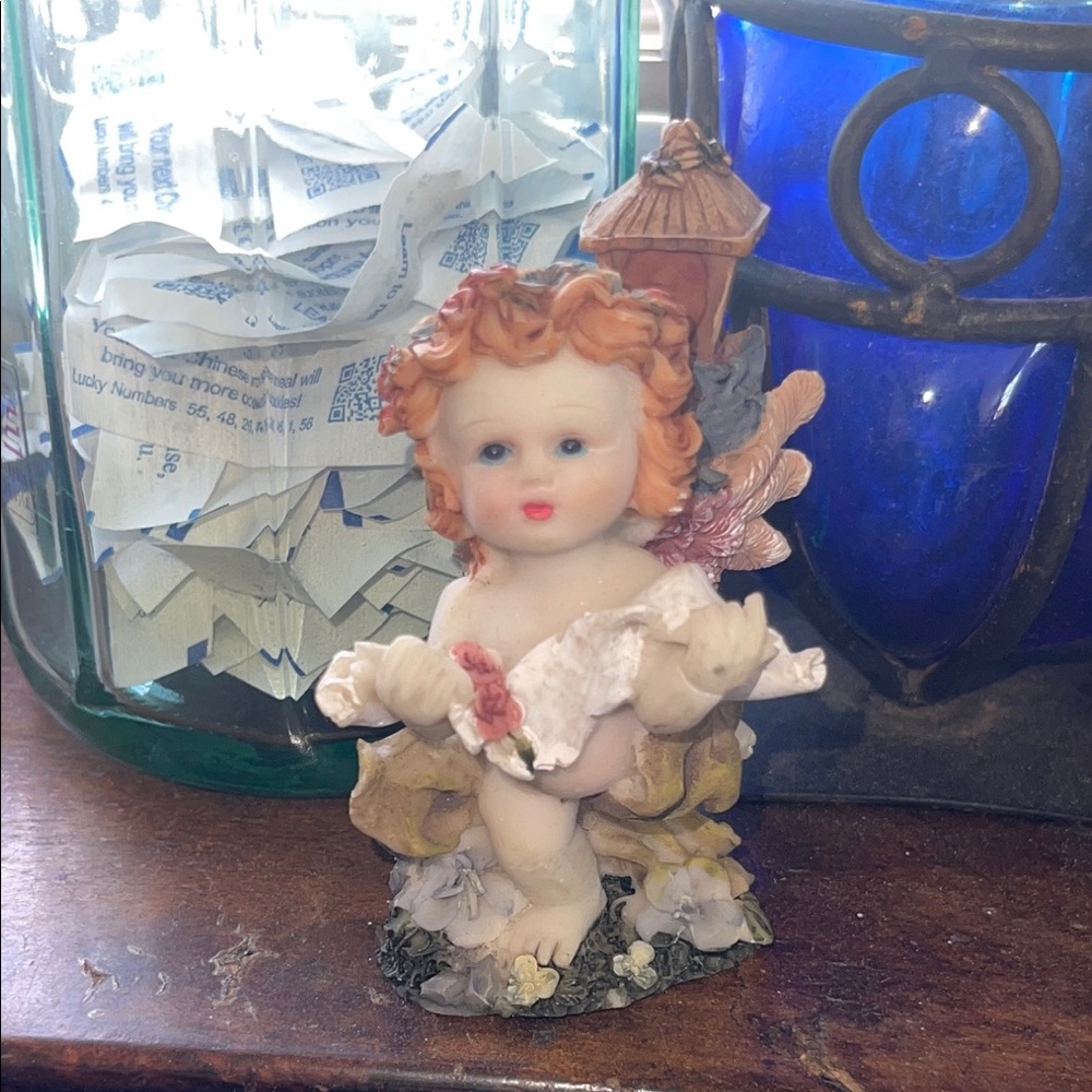 Cherub Figurine with Flowers